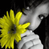 Девушка с жёлтым цветком