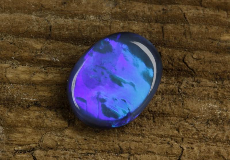 Фульгурит камень. Камень молния. Молния 42мм. Синий тигриный глаз камень. Камень молнии.